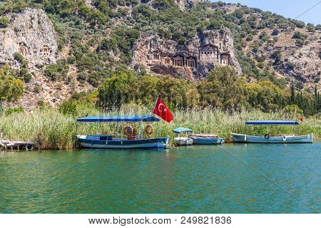 Lycian Tombs In The Mountains On The Dalyan River, Turkey. Dalyan Canal View. Dalyan Is Populer Tour