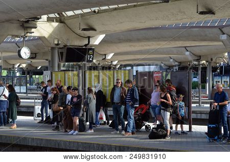 Platform and train view on Oslo central station. Oslo Central Station (Sentralstasjon) is main railway station in Oslo. June 17. 2018. Oslo,Norway