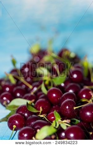 Cherry On A Blue Background, Close-up
