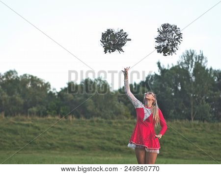 Teen Majorette Girl With Pom-poms