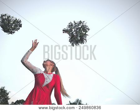 Teen Majorette Girl With Pom-poms