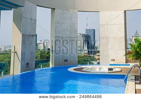Ho Chi Minh City, Vietnam - 4 April, 2018: View From The Swimming Pool Of The Central Palace Hotel A