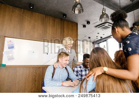 African And Caucasian Flesh-brokers In The Office