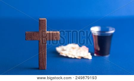 Symboles Of Christianity And The Communion On A Blue Background
