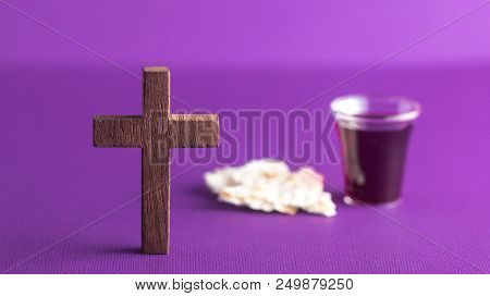 Symboles Of Christianity And The Communion On A Purple Background