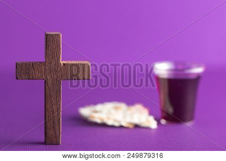 Symboles Of Christianity And The Communion On A Purple Background