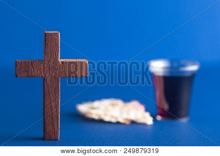 Symboles Of Christianity And The Communion On A Blue Background
