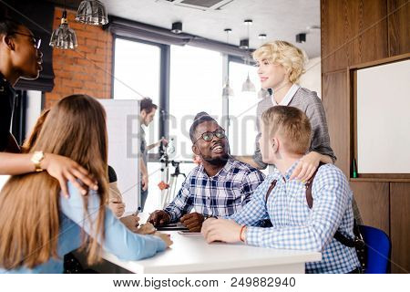 Meeting Friends At The Cafe With Loft Style. Concept Of United Co-workers