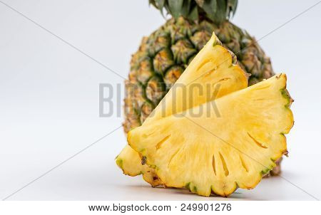 Healthy Sliced Pineapple Isolated On White Background
