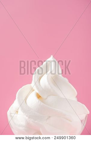Soft serve ice cream isolated with colored background, copy space(text space), blank for text, vanil