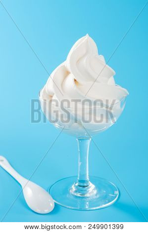 Soft serve ice cream isolated with colored background, copy space(text space), blank for text, vanil