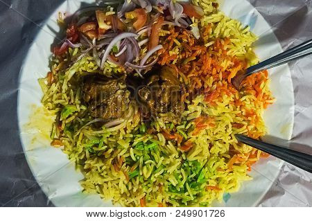 Fried Rice Nasi Goreng With Chicken And Vegetables On A Pan. Traditional Indian Fried Rice Briyani. 