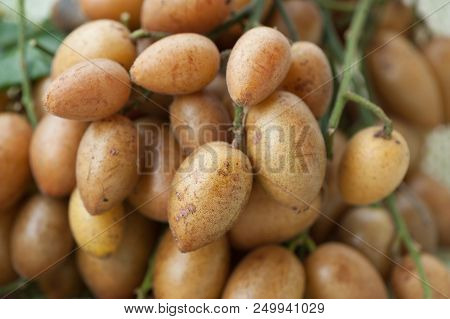Wampee Fruit Sell In The Tropical Fruits Market