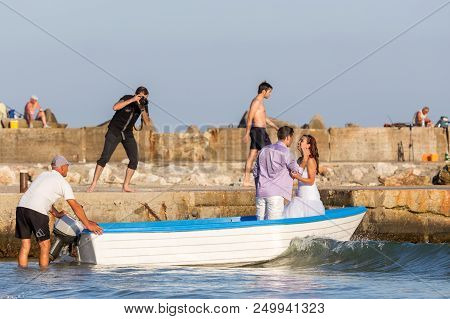 Bolata Beach, Bulgaria - Aug 3, 2014: Wedding And Lifestyle  Photographer Shoots A Couple Of Affecti
