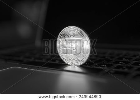 Dash Coin Symbol On Laptop. Concept Financial Currency, Crypto Currency Sign. Blockchain Mining. Dig
