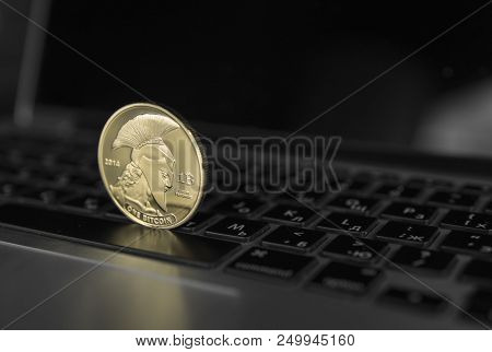 Titan Bitcoin Coin Symbol On Laptop. Concept Financial Currency, Crypto Currency Sign. Blockchain Mi