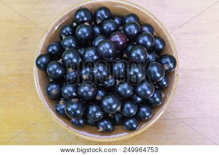 Delicious, Fragrant Black Currant Berries In A Bowl On The Table.