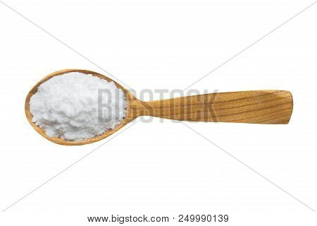 Salt For Adding To Food. Spice In Wooden Spoon Isolated On White. Seasoning Of Delicious Meal.