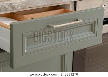 Shelf With Cutlery In The Kitchen With A New Design