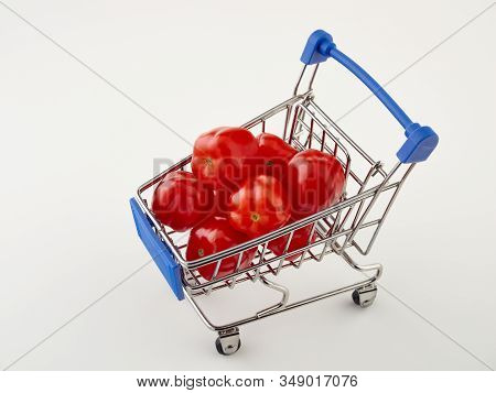 Ripe, Red Cherry Tomatoes Of The Confetto Variety.isolate.white Background