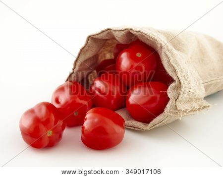 Ripe, Red Cherry Tomatoes Of The Confetto Variety.isolate.white Background