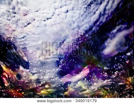 Arrow Of Clouds On A Dark Blue Sky