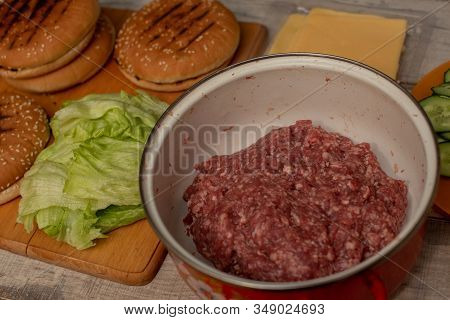 Cooking Hamburgers, Making A Hamburger, Pictures With Buns, Raw Meat, Cheese And Vegetables On The T