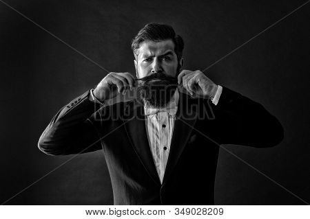 Proud Of His Moustache. Brutal Hipster Twirl Moustache. Serious Guy Wear Long Beard And Moustache. B