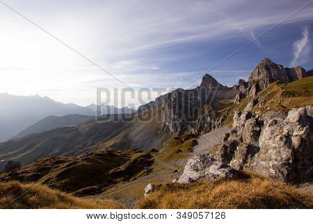 Warm Evening Sunlight Illuminating The Mountains In Central Switzerland