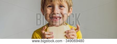 A Boy, 6 Years Old, Holds A Box For Milk Teeth. Change Of Teeth Banner, Long Format