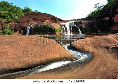 Tham Phra Waterfall,is One Of The Beautiful Falls Located In The Phu Wua Wildlife Sanctuary,
Bueng K