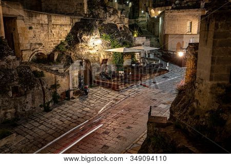 Matera, Italy - September 19, 2019: Evening View Of The City Of Matera, Italy, With The Colorful Lig