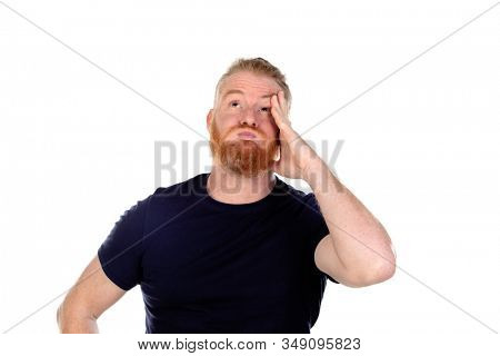 Red haired man with long beard thinking isolated on a white background