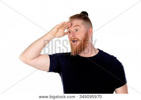 Red haired man with long beard looking out isolated on a white background