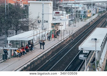 Lisbon, Portugal - January 17, 2020: Passengers Wait For The Train At The Belem Railway Station In L