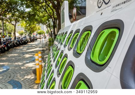 Taipei, Taiwan - August 17th, 2019: charging station for battery packs of Taiwan-based Gogoro electronic motocycle at street in Taipei, Taiwan, Asia