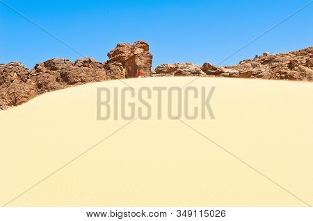 Lonliess And Vastness  - Desert Landscape With One Man In The Background In The Eastern Part Of The 