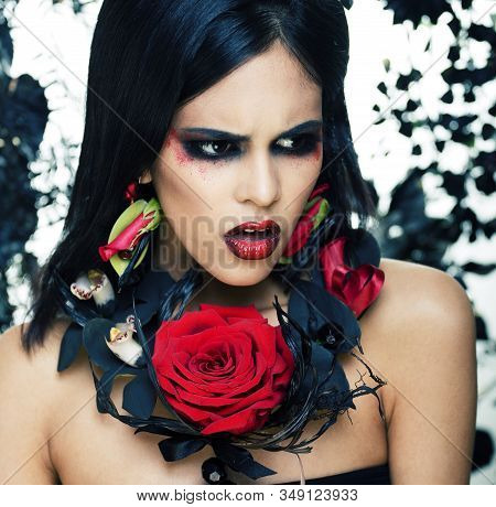 Pretty Brunette Woman With Rose Jewelry, Black And Red, Bright Make Up Kike A Vampire Closeup Red Li
