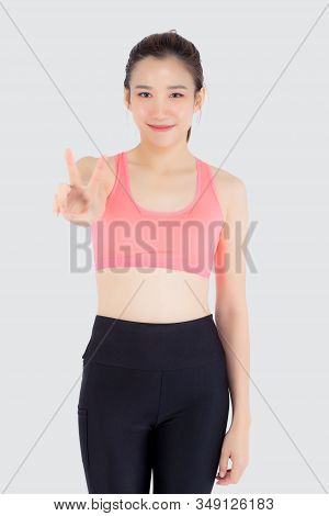 Beautiful Portrait Young Asian Woman In Sport Clothes With Satisfied And Confident Gesture Finger V 