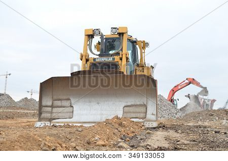 08.11.2019 Minsk, Belarus: Track-type Bulldozer Caterpillar D6t , Earth-moving Equipment Background