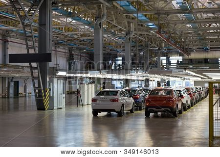 Russia, Izhevsk - December 14, 2019: Lada Automobile Plant Izhevsk. The Row Of New Cars Lada Ready F
