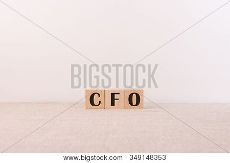 Cfo Concept With Cubic And Letters On A White Background