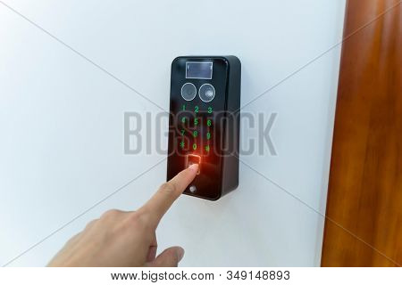 Scanning fingerprint to open security door in private building