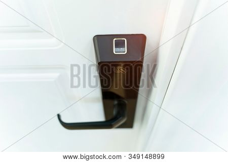 Scanning fingerprint to open security door in private building