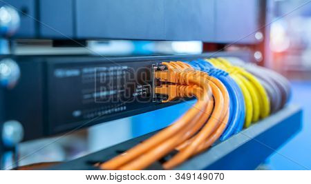 network cable connecting on network core switch close up