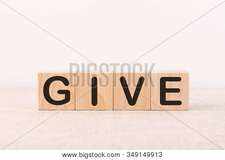 Give Word Made With Building Blocks On A Light Background