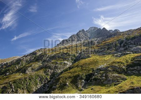 Mountains And Alps In Switzerland On A Sunny Summerday
