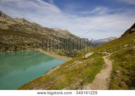 Dam Impounding Lake Goeschenen In The Swiss Alps
