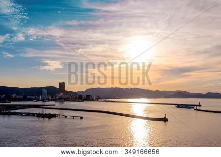 Takamatsu, Japan - 25 Sep 2019 : The view of Takamatsu Bay and City while the sun is setting.
