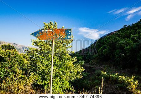 Fterre, Albania - August 02, 2014. Sign Board Damadged Of The Shots Of Gun In Albanian Mountains